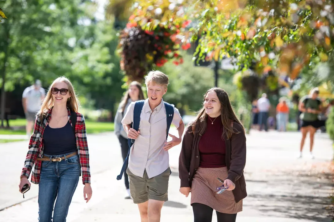 students walking across campus